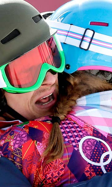 Former US snowboarder Wild wins parallel giant slalom gold for Russia